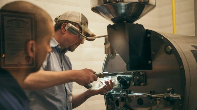 man fixing machine