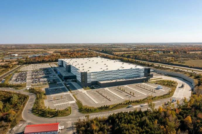 a large building with a parking lot