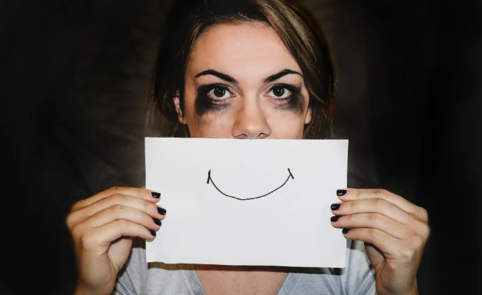 person holding white printer paper